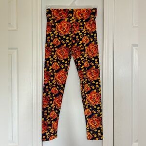Navy LuLaRoe Leggings with Red and Yellow Floral Design